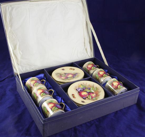 A boxed Aynsley fruit decorated coffee set,